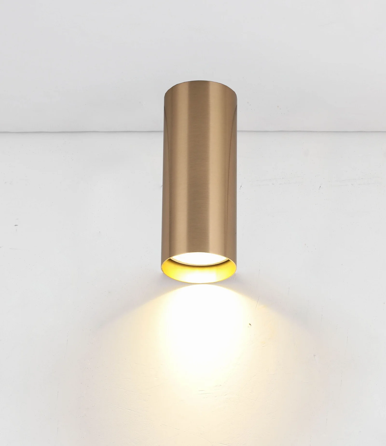 tubes-ceiling-brushed-brass-light-on.jpg